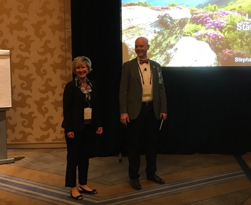 Tennessee CIO Stephanie Dedmon, left, stands with Adobe manager Earl Moore, at the 2018 NASCIO conference in San Diego. (StateScoop)