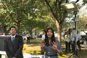 D.C. CTO Archana Vemulapalli and OCTO's director of telecommunications demo the new sensor-enabled LED lights. The lights are equipped with motion sensors that illuminate the lamp when movement is detected within 100 meters of the sensor. (StateScoop)
