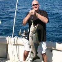 Eric Davis holds a fish