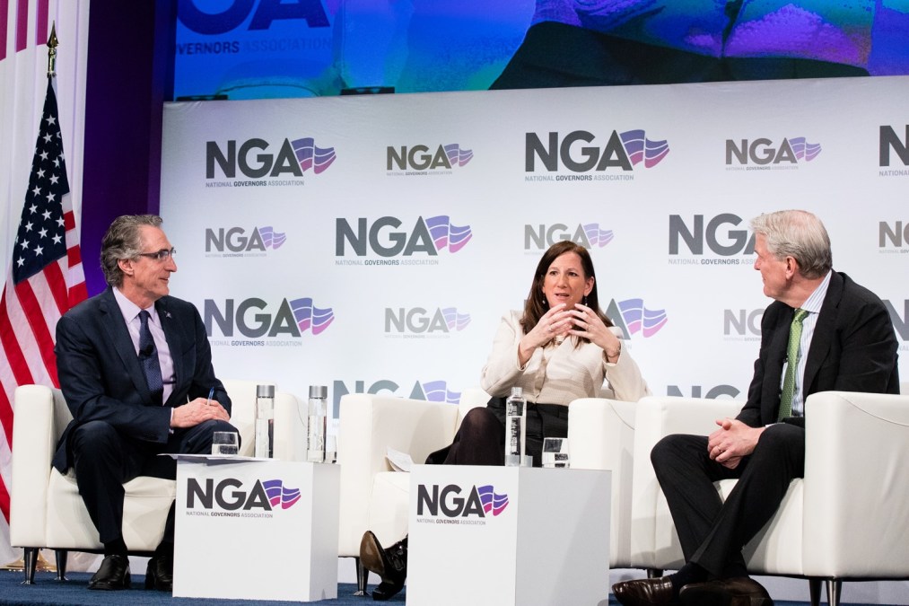 Deloitte CEO Cathy Engelbert, North Dakota Gov. Doug Burgum and Itron CEO Philip Mezey