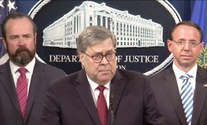 U.S. Attorney General William Barr, center, with Acting Associate Deputy Attorney General Ed O'Callaghan, left, and Deputy Attorney General Rod Rosenstein