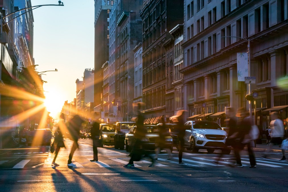 people crossing the street in Manhattan