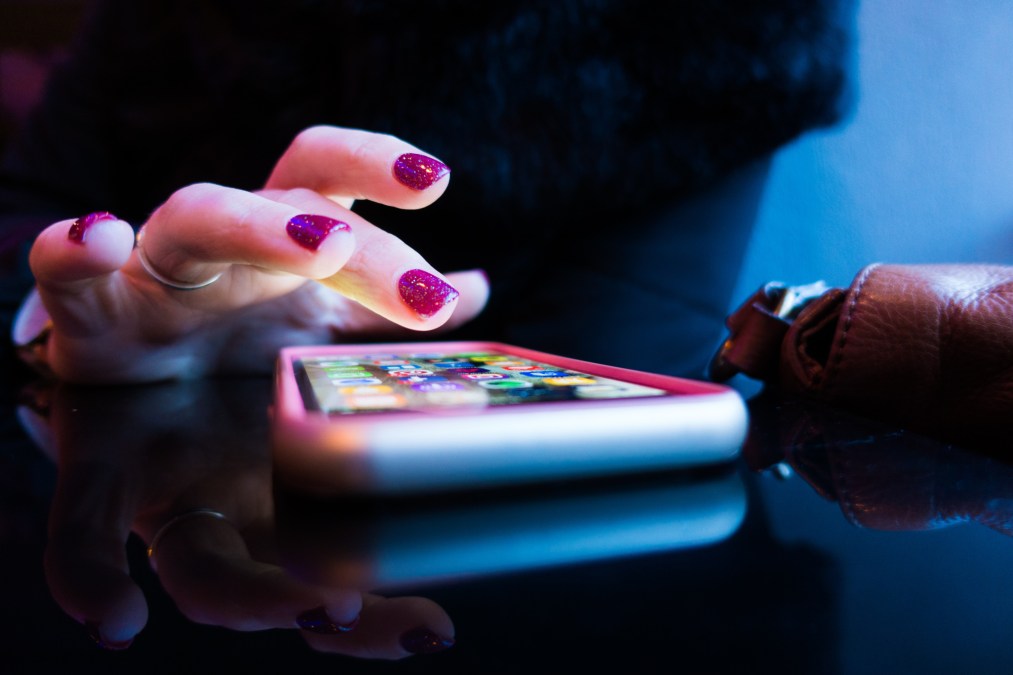 woman using smartphone