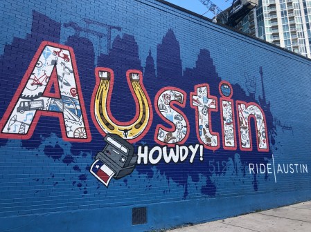 brick wall with the word Austin on it