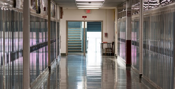 school hallway lined by lockers