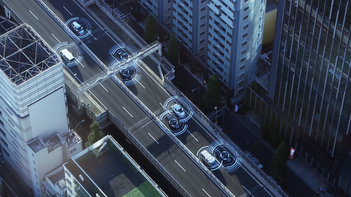 overhead view of city with connected vehicles