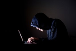 hacker guy with laptop