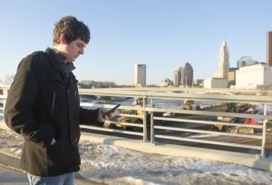 young man using smartphone in Columbus, Ohio