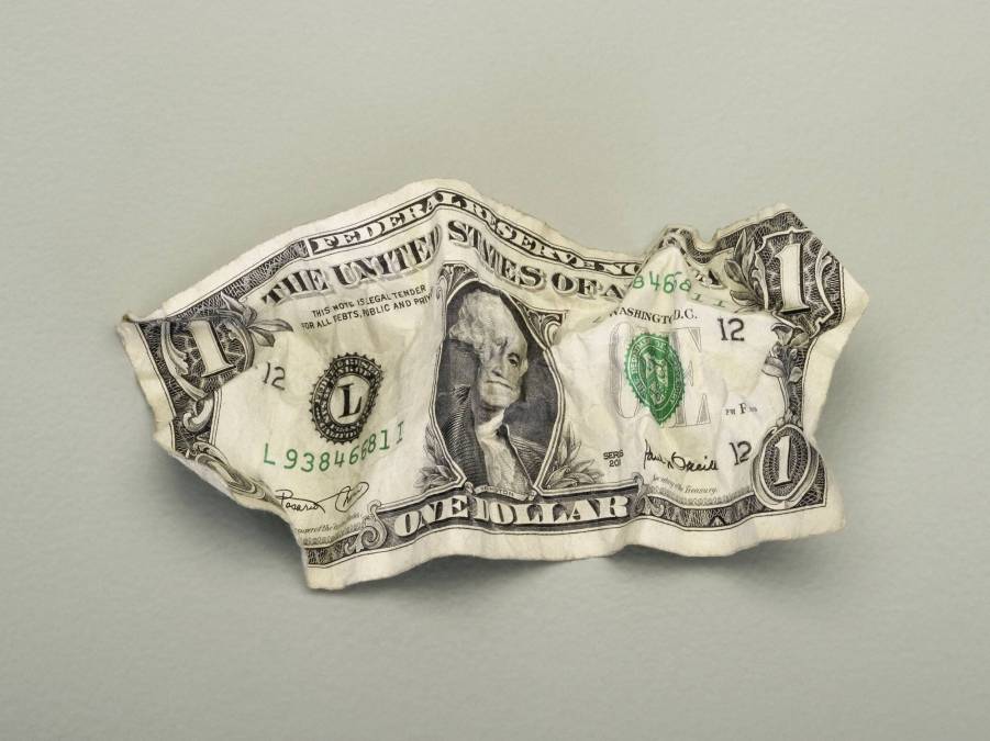 crumpled dollar bill