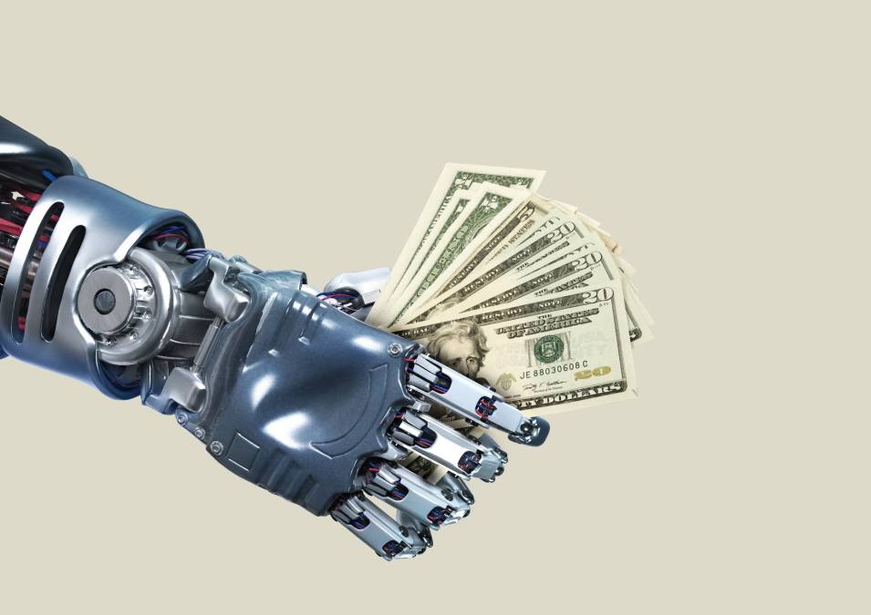robot hand holding cash
