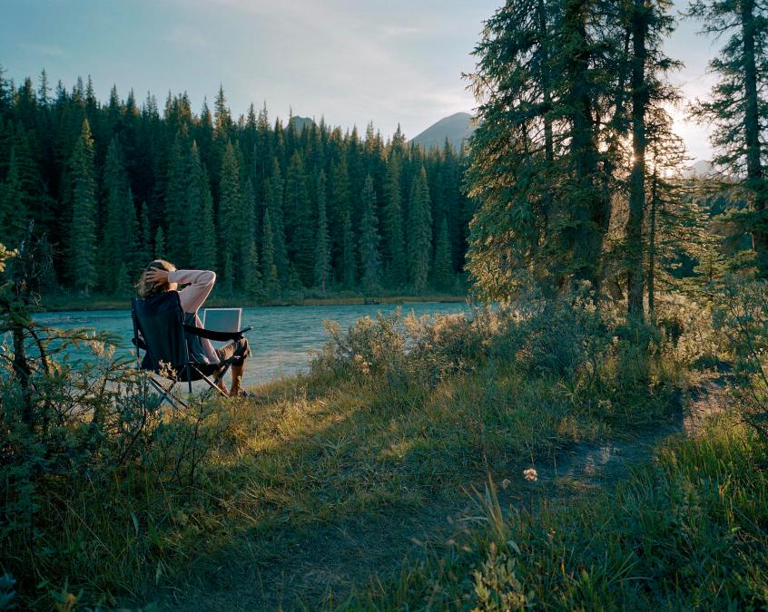 person working from chair