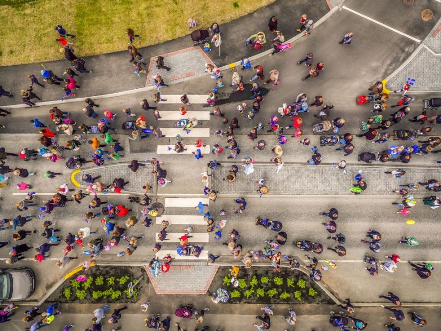 aerial shot of people walking in the street