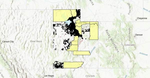 A screenshot of the property valuation tool showing the state of utah with some counties that have not submitted data highlighted in yellow, with residential areas that have submitted data in black.