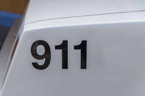 911 on side of car