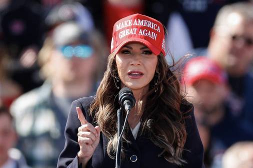 South Dakota Gov. Kristi Noem wearing MAGA hat