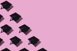 mortarboards on pink background