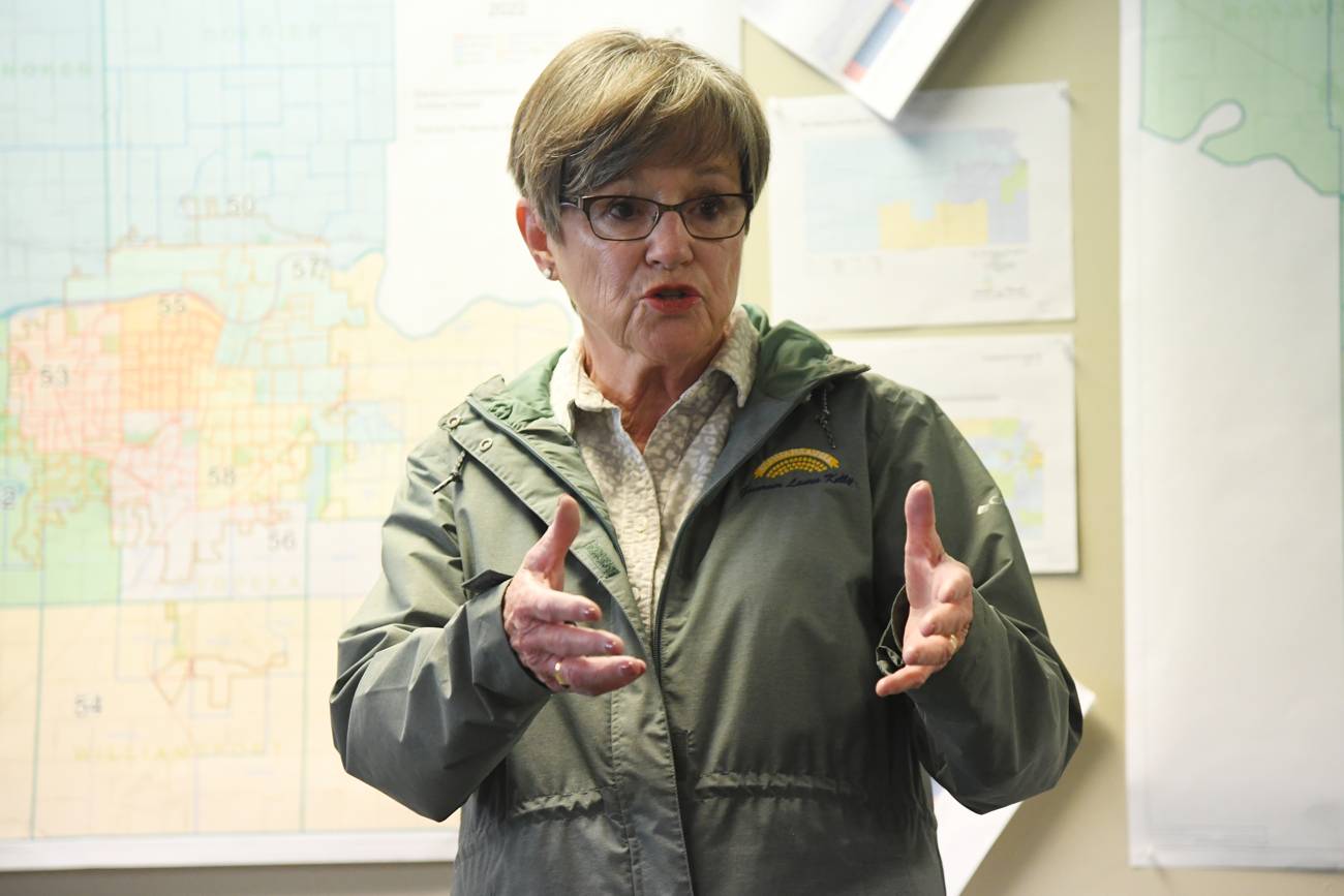 Kansas lawmakers overturn governor's veto, approving voting system ...
