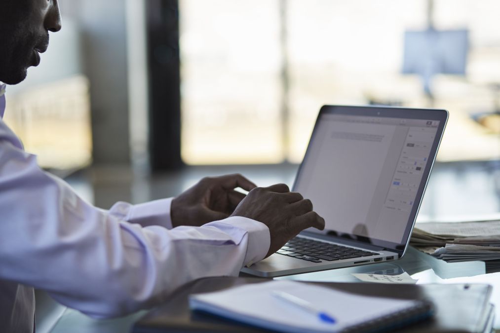 business guy on computer